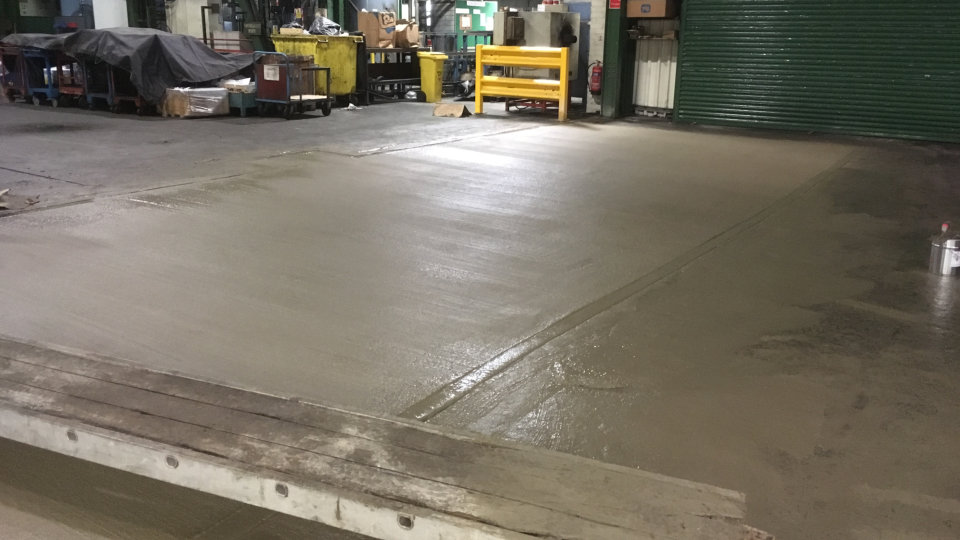freshly mixed and laid concrete floor